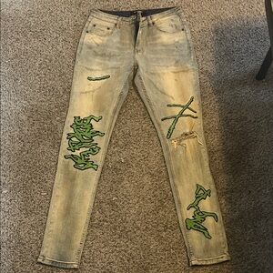 Stylish Tan Jeans with Green Accents